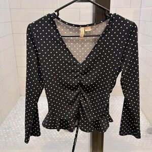 Navy blue long sleeve shirt.